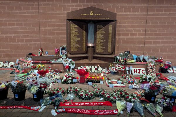Wreaths and tributes to the 97 at the Hillsborough Memorial outside Anfield Stadium in Liverpool. Credit: Alex Blair / Garden Court North Chambers.