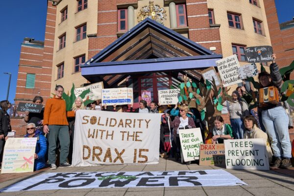Protestors outside Leeds Magistrates Court yesterday (23 September 2025) in support of the 'Drax 15'. Credit: Reclaim the Power.