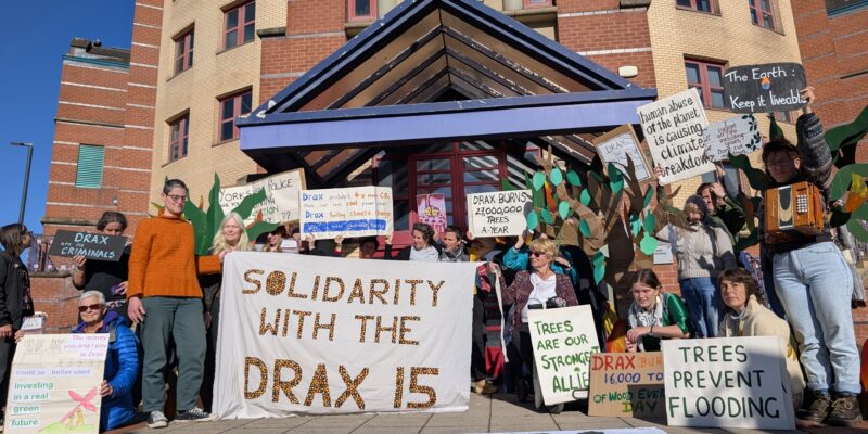 Protestors outside Leeds Magistrates Court yesterday (23 September 2025) in support of the 'Drax 15'. Credit: Reclaim the Power.