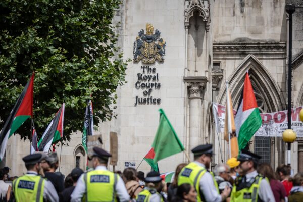 Protestors outside the Royal Courts of Justice in London demonstrate against Palestine Action's proscription in July 2025. Credit: Pete Speller / Shutterstock.