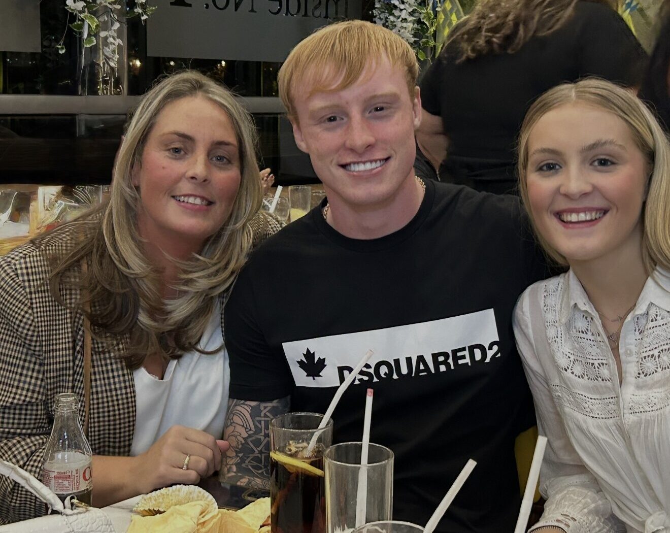Josh Perry (pictured, middle). Credit: Family Handout.