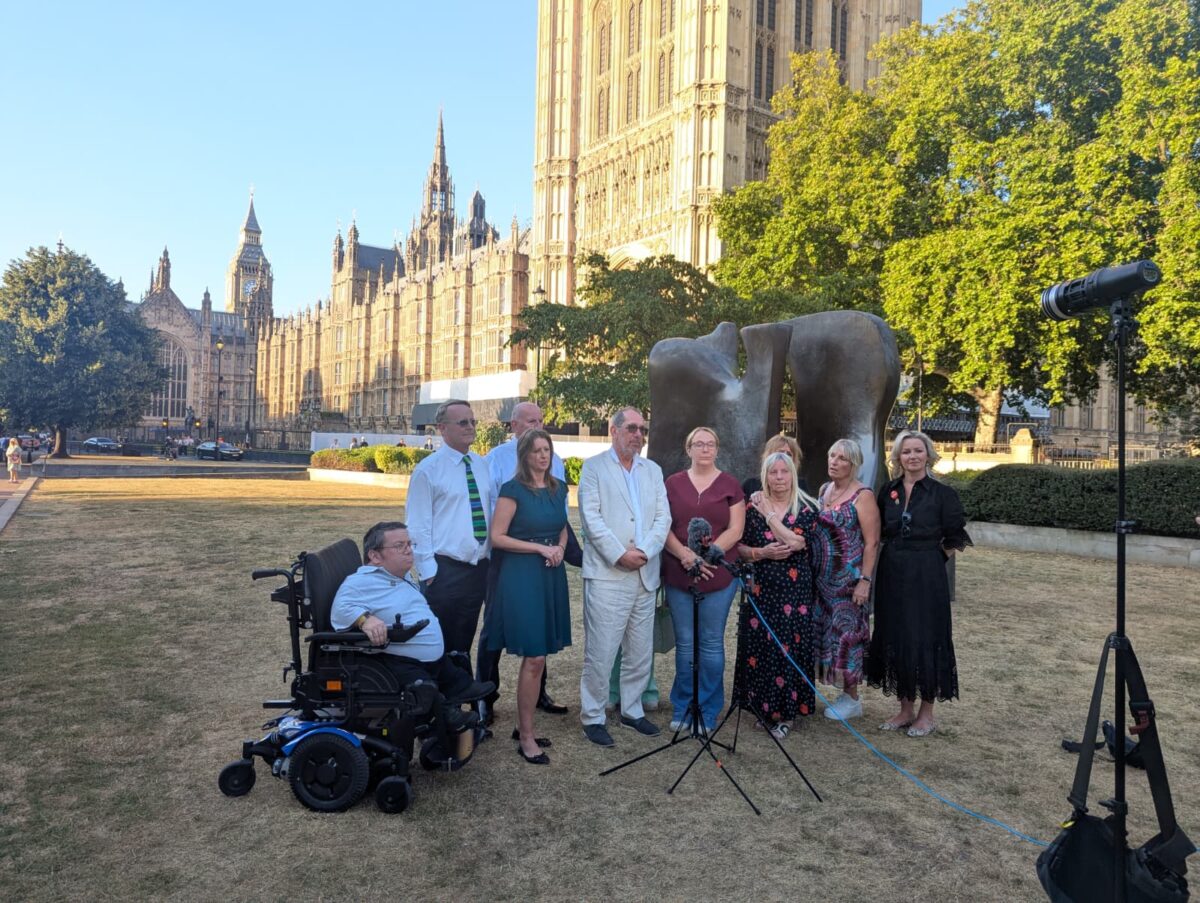 Hillsborough Law Now campaigners stand outside the Houses of Parliament, including Garden Court North's Pete Weatherby KC (second from left). Credit: Alex Blair / Garden Court North Chambers.