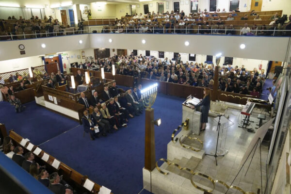 Communities Secretary Angela Rayner addresses the memorial for Adrian Daulby and Melvin Cravitz. Credit: Heaton Park Hebrew Congregation Synagogue.