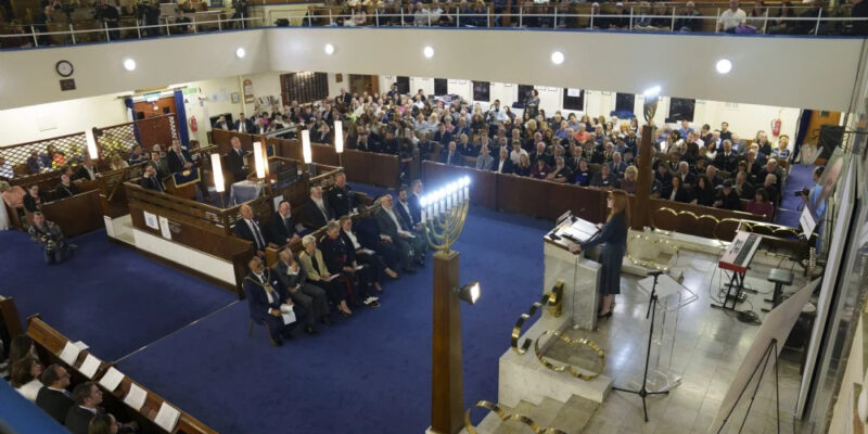 Communities Secretary Angela Rayner addresses the memorial for Adrian Daulby and Melvin Cravitz. Credit: Heaton Park Hebrew Congregation Synagogue.